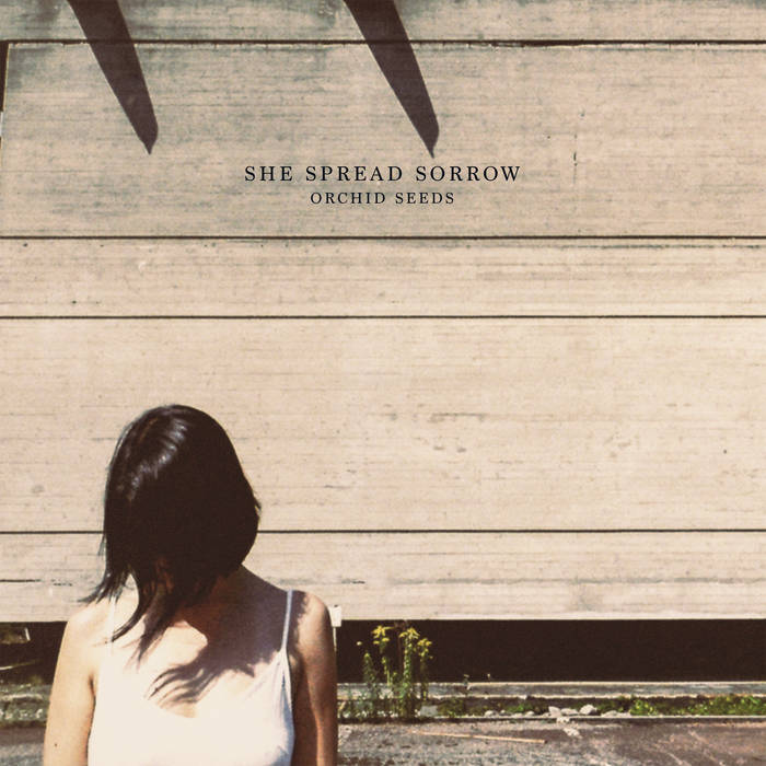 she spread sorrow // orchid seeds LP